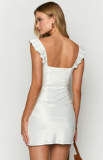 Rear view of a white mini dress with ruffled shoulder straps and a low scoop back