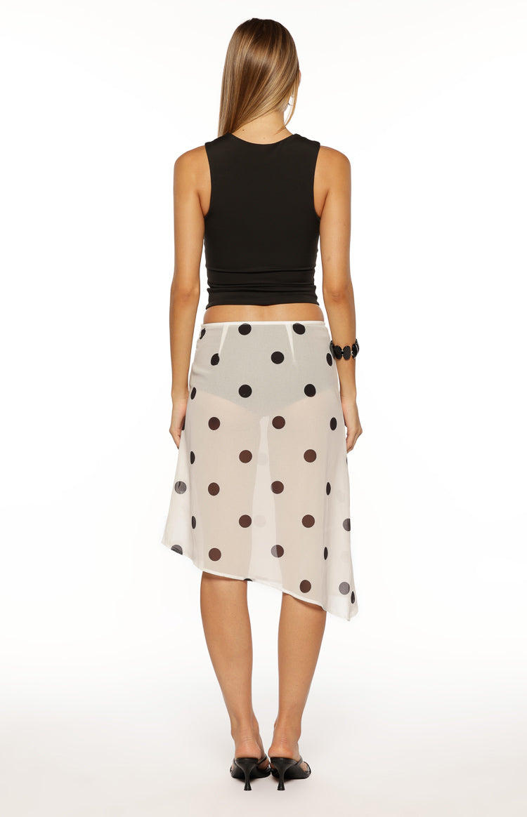 Rear view of a black fitted tank top with a high rounded back and a cropped length