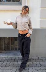 Beige plaid funnel neck jacket with a cropped elasticated hem and long billowy sleeves