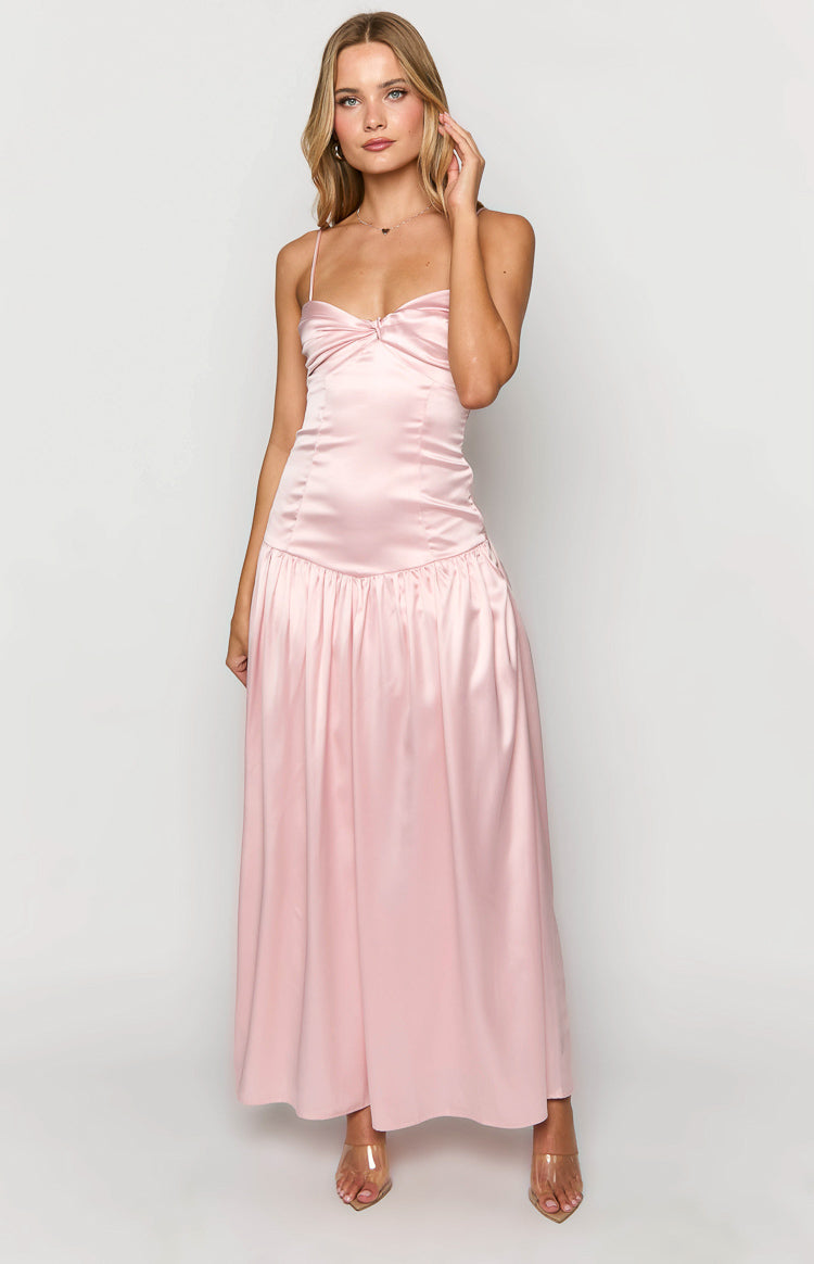 Pink satin maxi dress with a twisted sweetheart neckline, thin spaghetti straps, and a gathered dropped waist