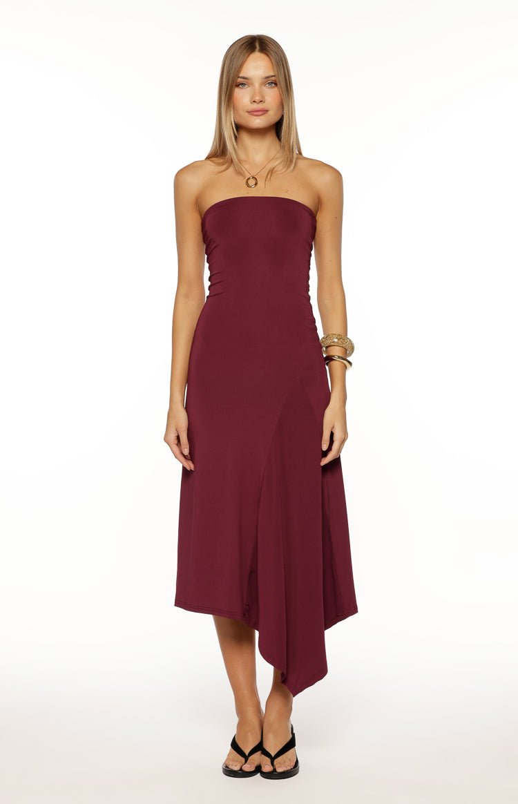 Plum strapless midi dress with a fitted bodice and a flowing asymmetrical hemline