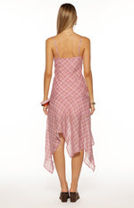 Rear view of a pink plaid hanky hem midi dress with thin spaghetti straps