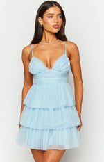Front view of a light blue tulle mini dress with a ruched V-neck bodice and tiered ruffle skirt