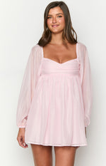 Pink mini dress with a sweetheart neckline, sheer voluminous long sleeves, and a gathered empire waist