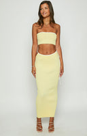 Beginning Boutique Pia Yellow Contrast Bind Knit Tube Top yellow ribbed knit strapless tube top with white contrast binding and cropped fit