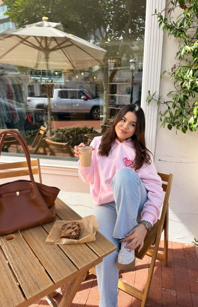Beginning Boutique Beginning Pink Lovey Bubble Hoodie light pink oversized hoodie with a hood, long sleeves, and a pink heart