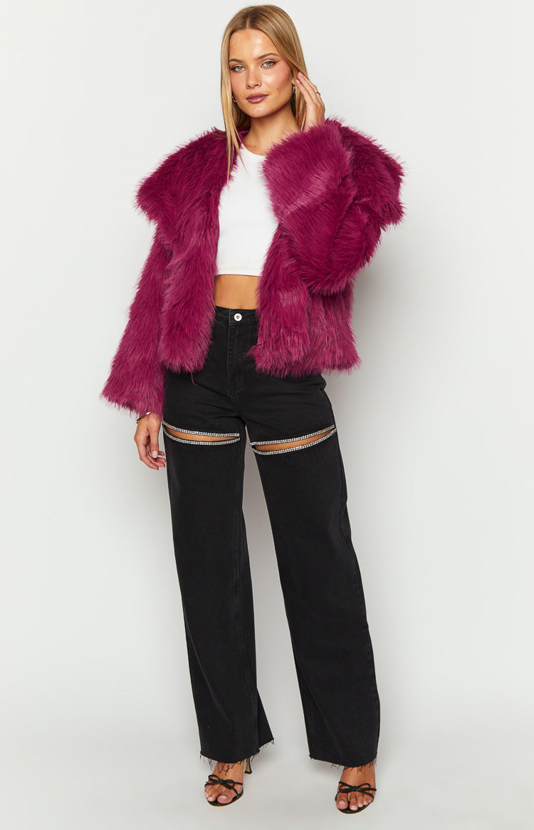 Full length view of a shaggy purple faux fur jacket with wide lapels and long sleeves