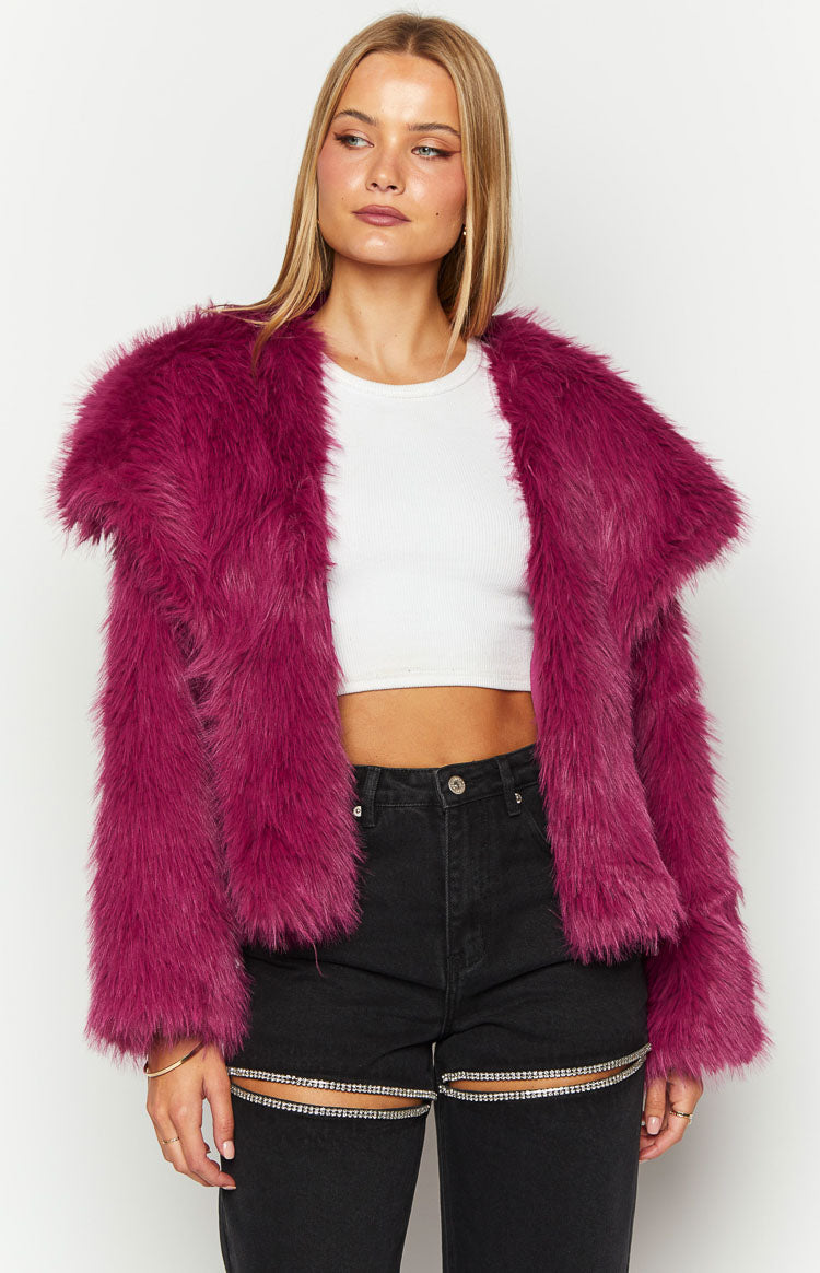 Front view of a vibrant purple shaggy faux fur jacket with wide open lapels