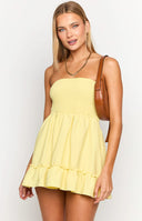 Beginning Boutique Sundazed Yellow Strap Back Dress light yellow strapless mini dress with shirred bodice and ruffled hem
