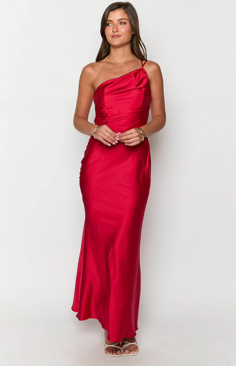 Front view of a red satin maxi dress with an asymmetric draped one-shoulder neckline and a flowing skirt
