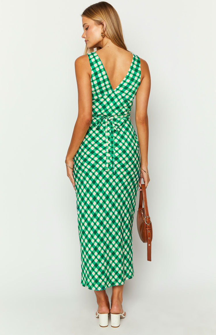 Rear view of a green and cream check maxi dress with a V-neck back and tie waist