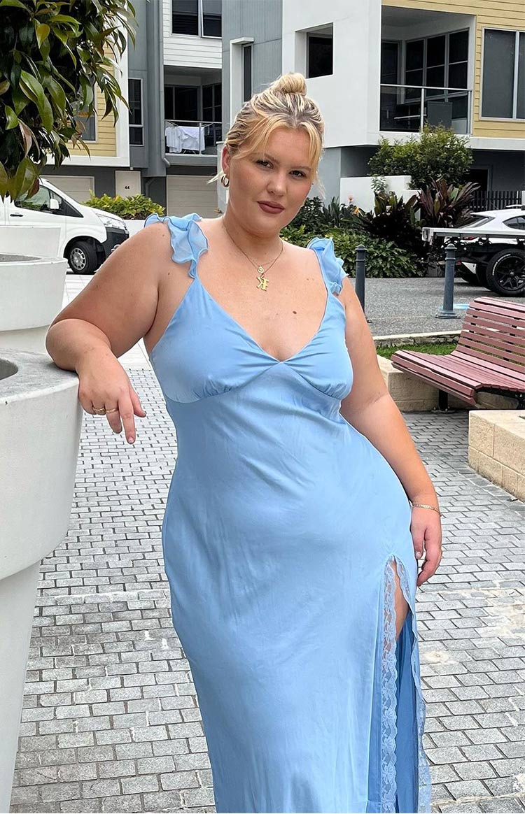 Light blue satin maxi dress with ruffled shoulder straps and a high side split with lace trim