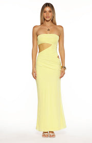 Yellow strapless maxi dress with side cutouts and ruched detailing on the waist